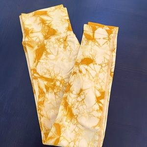 PCHEEBUM leggings in yellow, size medium.
